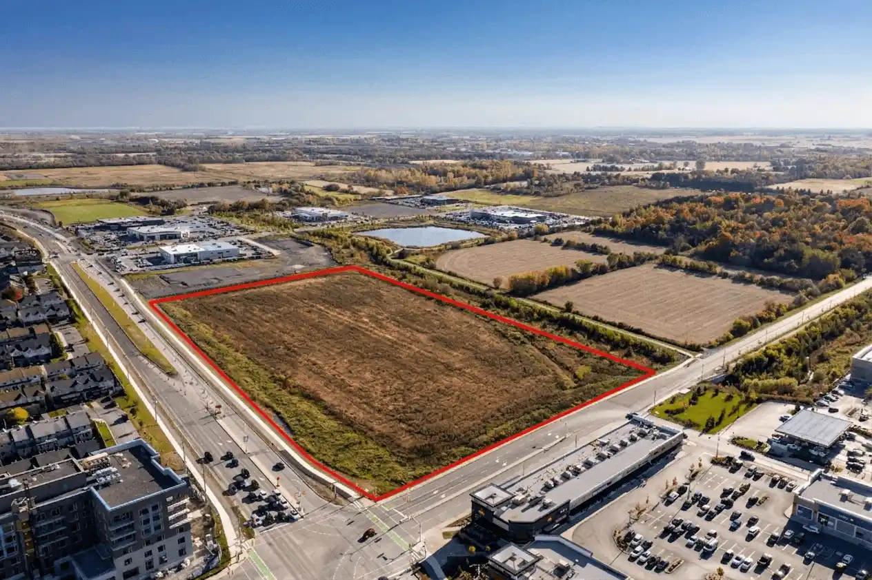 Aerial photo of a development lot with its boundary outlined in red